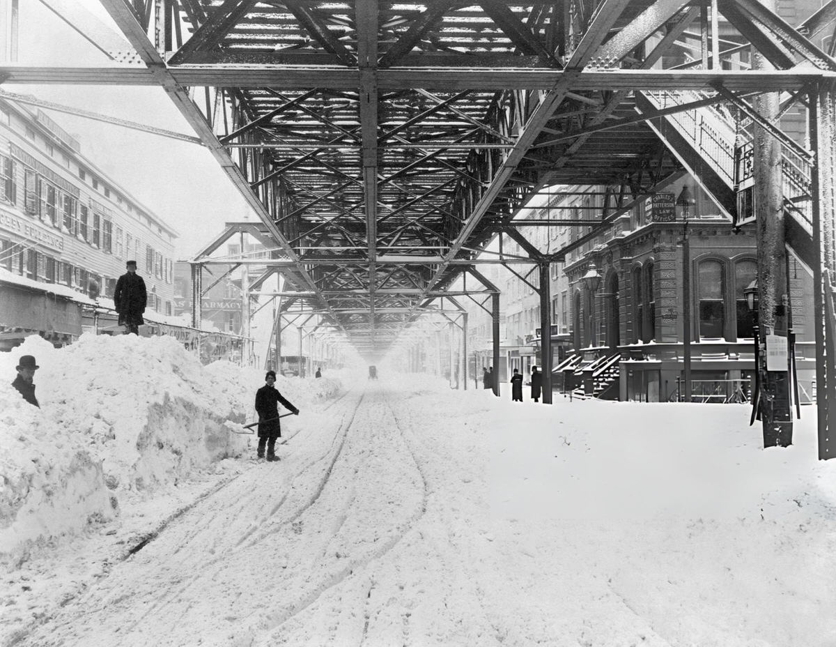 Workers Clearing Snow From Underneath An Elevated Train Line After The Blizzard Of 1888.