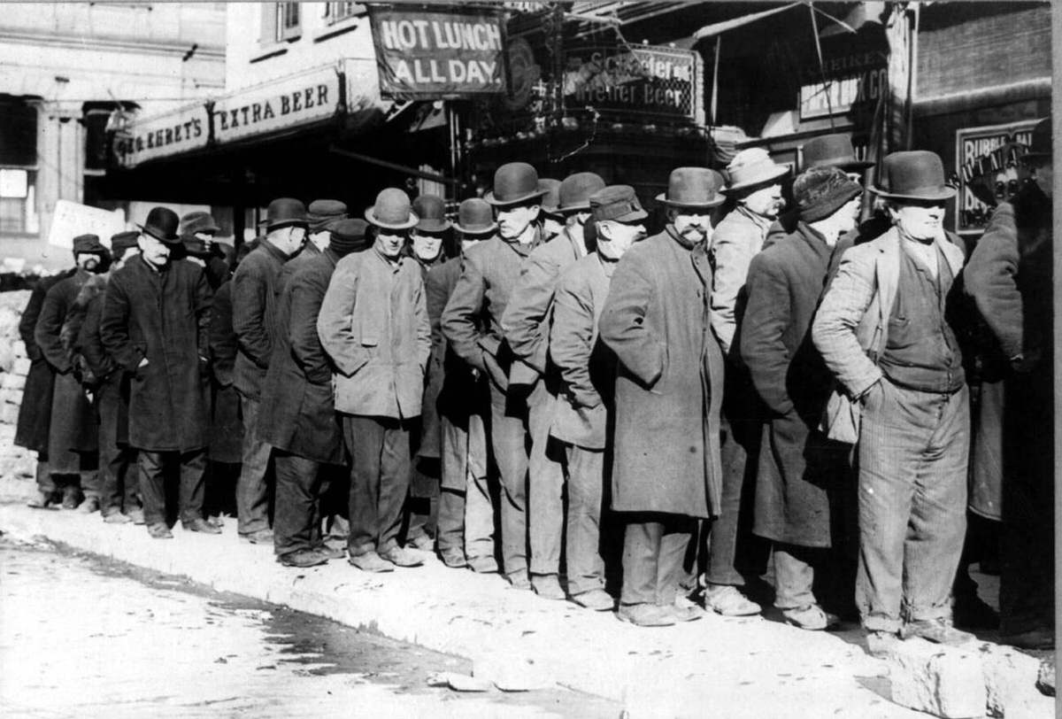 Men Waiting In A Bread Line, New York.