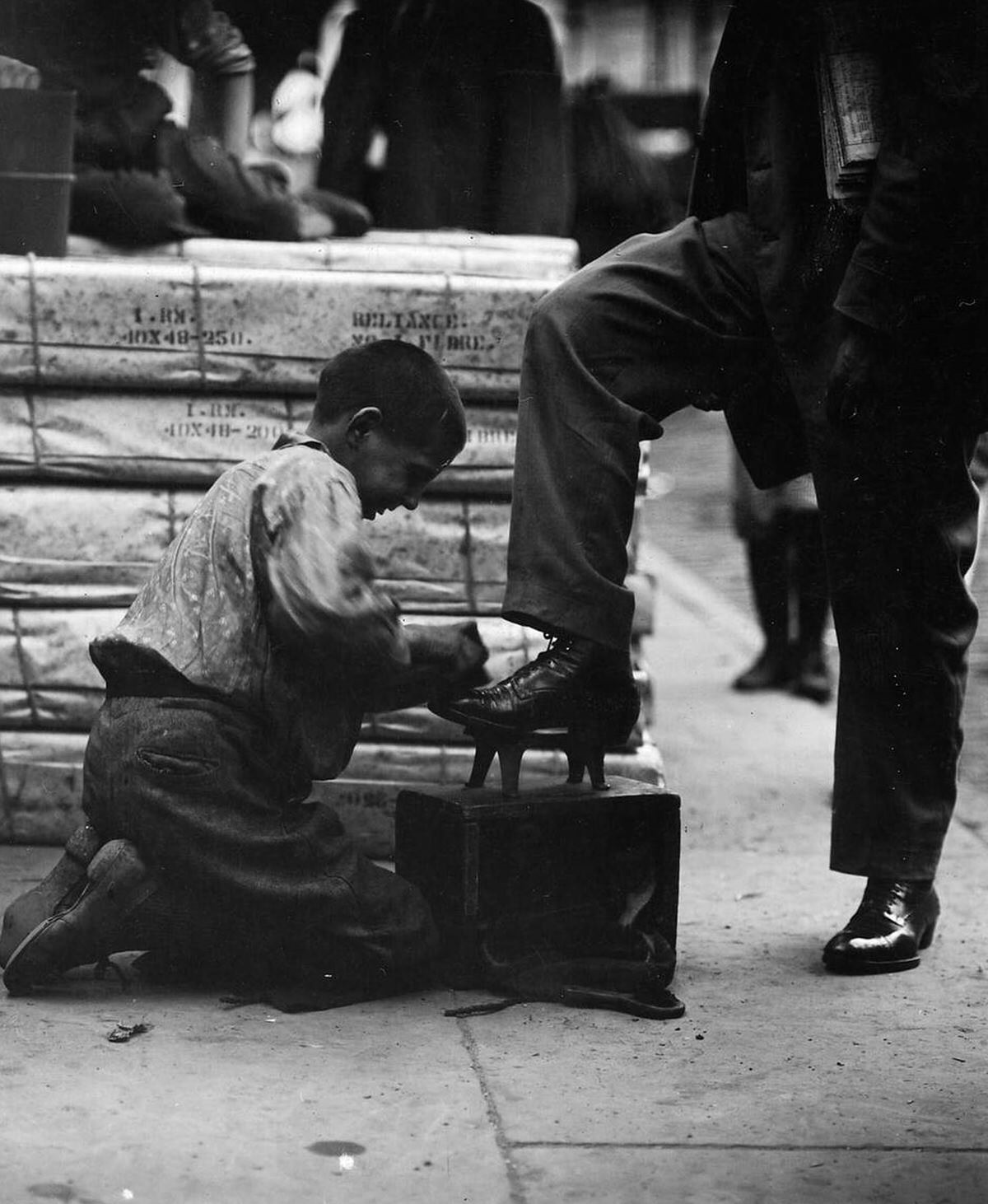 Bootblack Working In The Bowery, New York.