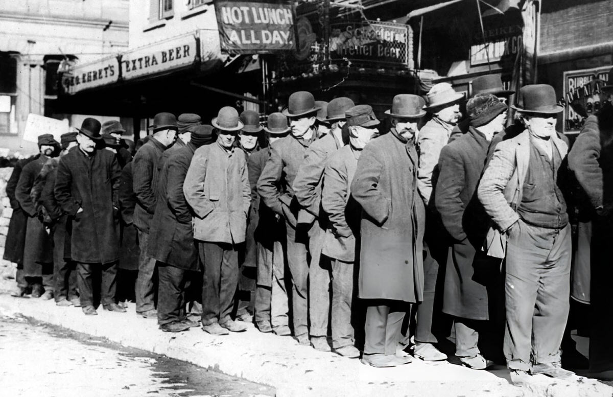Men In A Breadline On A Bowery Sidewalk, Lower Manhattan, 1910.