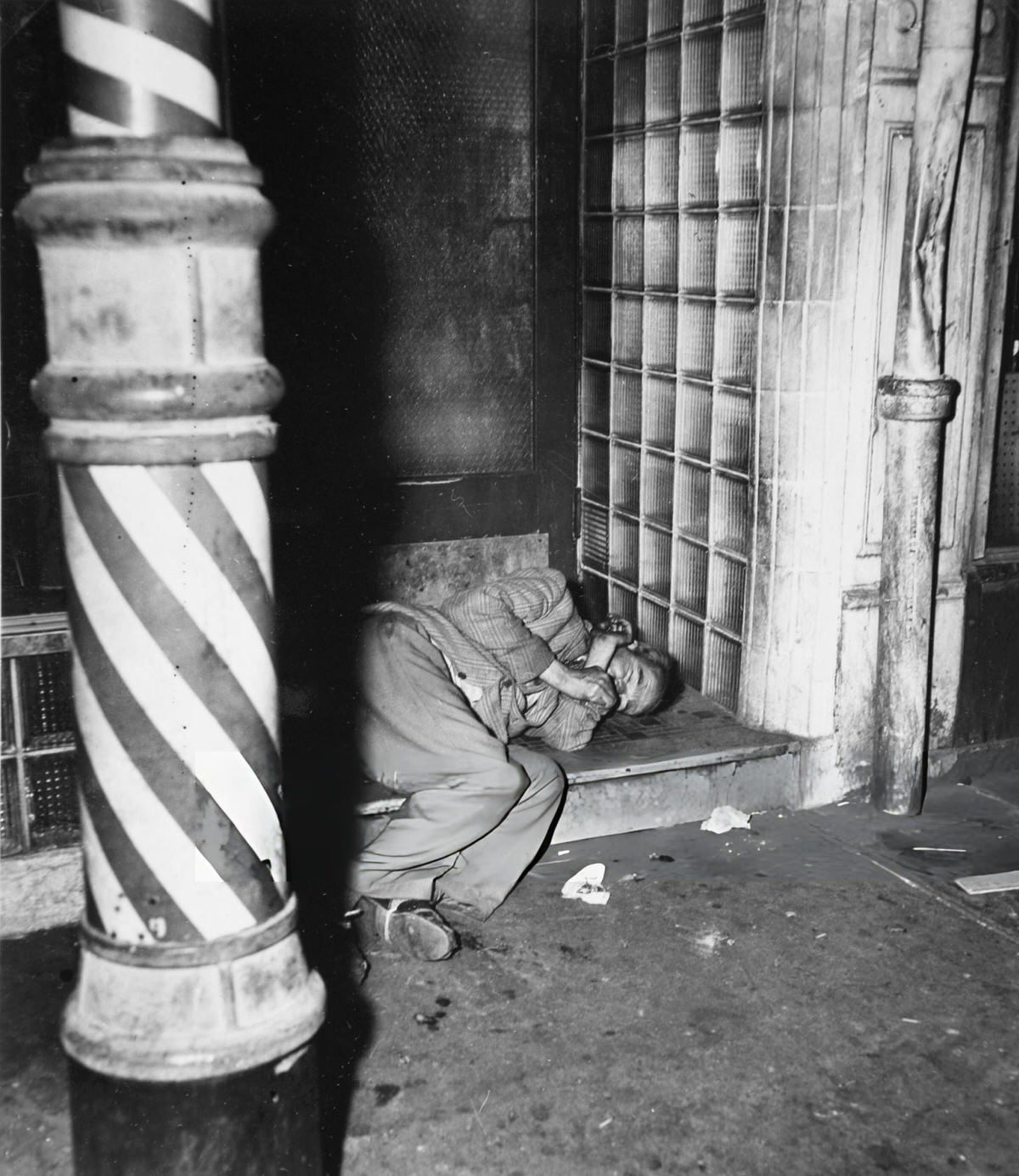 Man Sleeping On A Sidewalk In The Bowery, New York, 1940S.