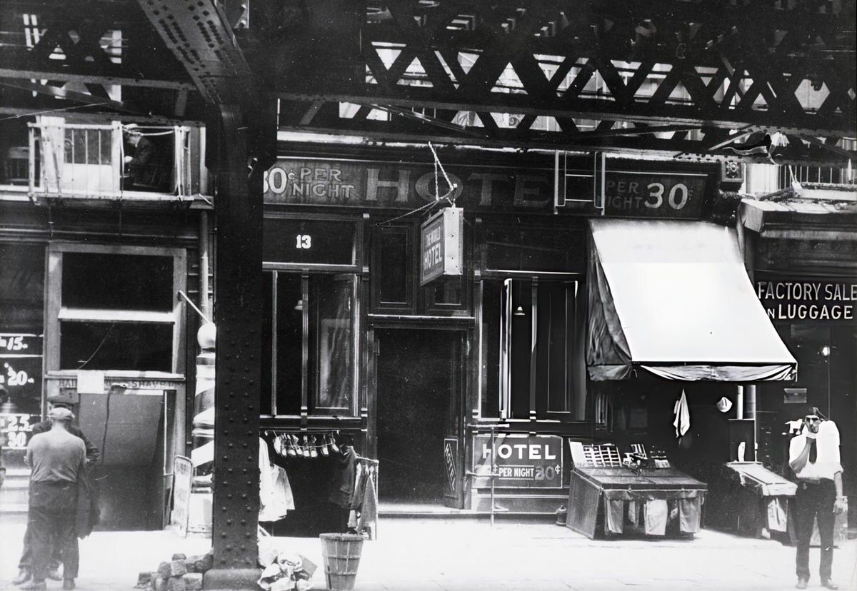 Transit Hotel In The Bowery Advertising Rooms For 30 Cents, New York, 1943.