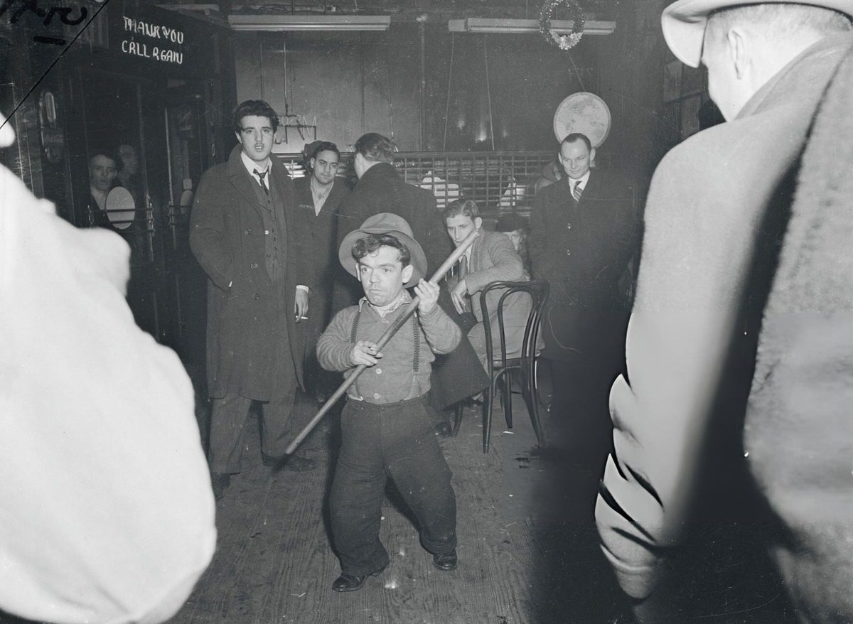 Man Holding A Pool Stick At Sammy'S Bowery Follies, New York.