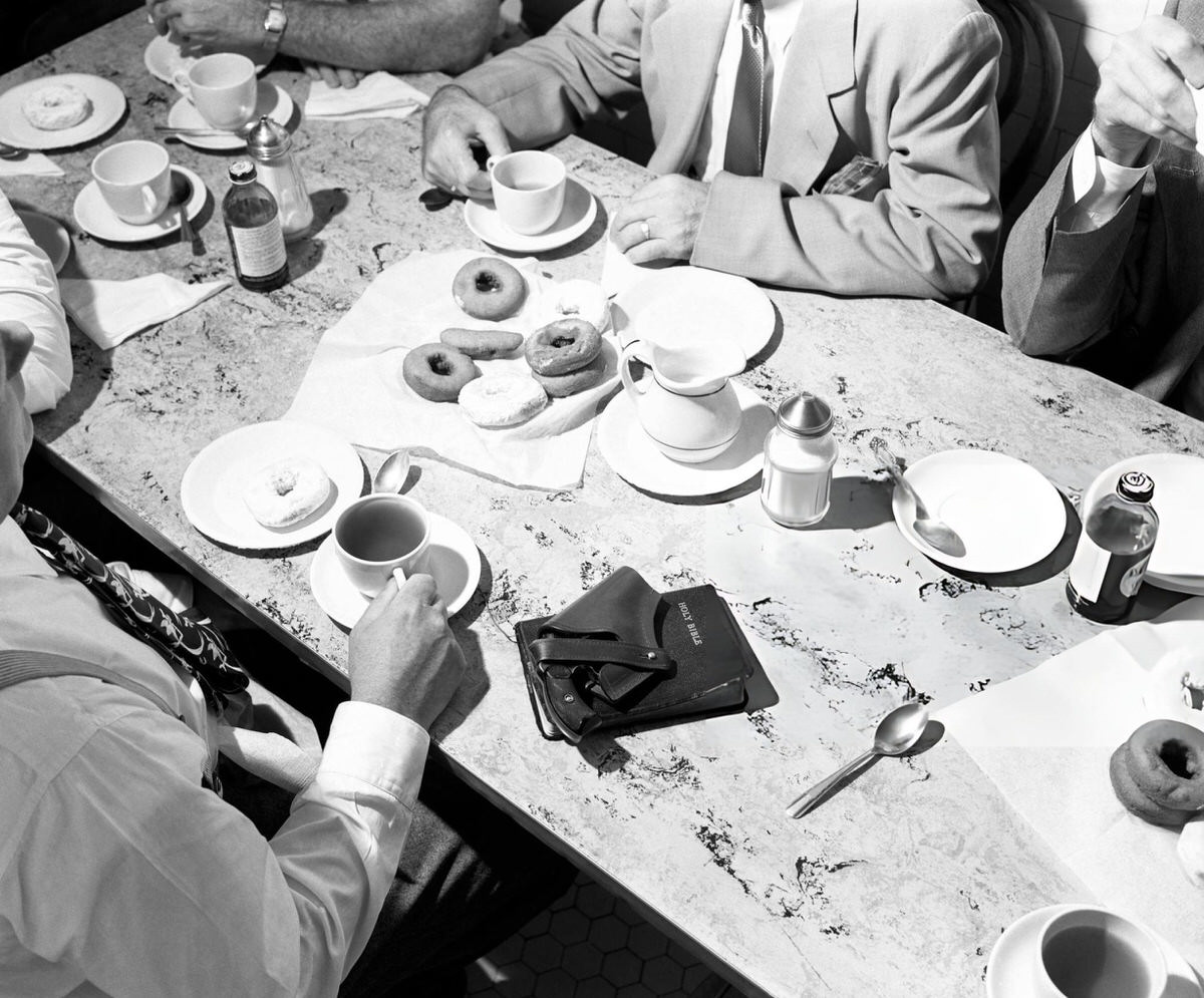 Men Eating Doughnuts And Drinking Coffee Before A Service At The Bowery Mission, New York, 1945.