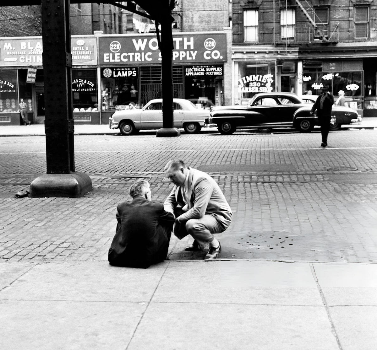 Man Speaking To A Homeless Person Outside The Bowery Mission, New York, 1945.