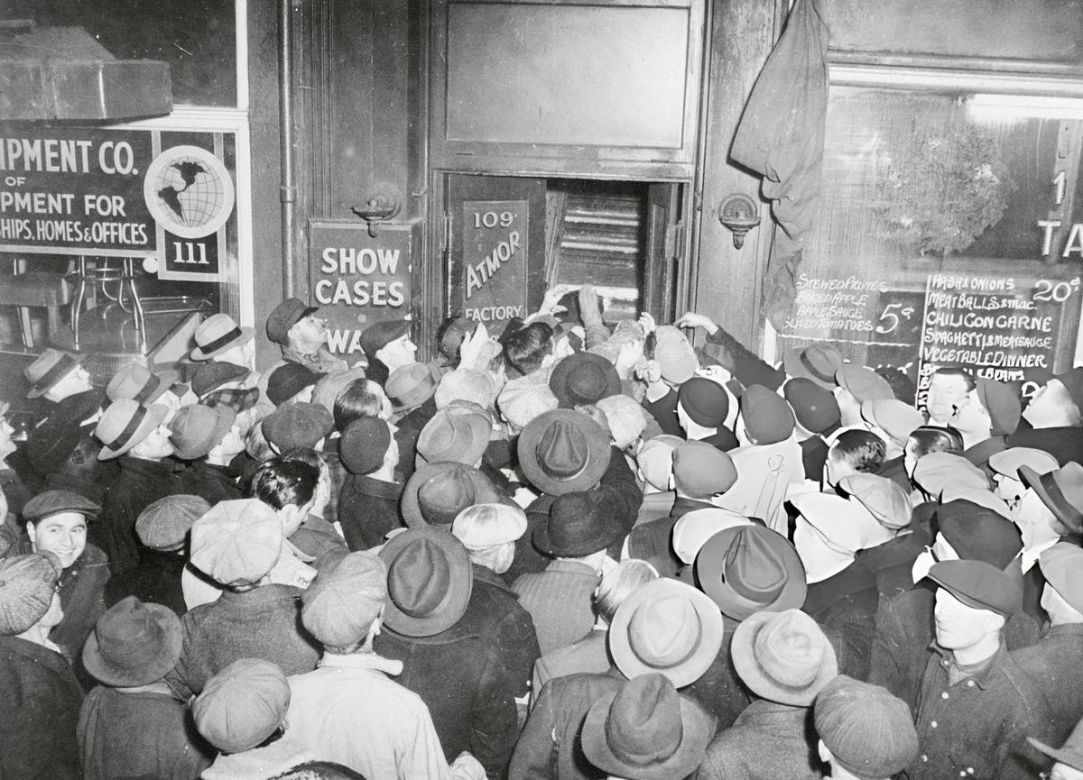 Crowds Surrounding Joe Bonavito As He Distributes Money To Residents Of The Bowery, New York, 1946.