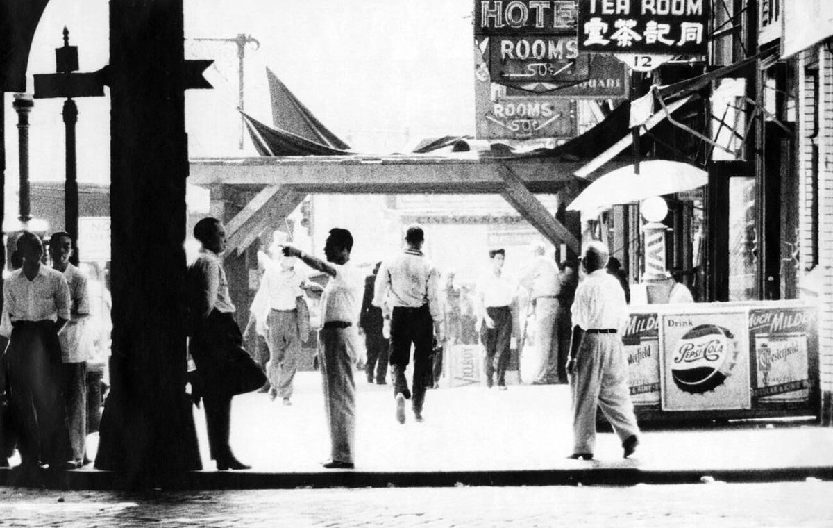 Pedestrians And Storefronts Including A Hotel And A Tea Room With Chinese Characters, New York, 1940S.