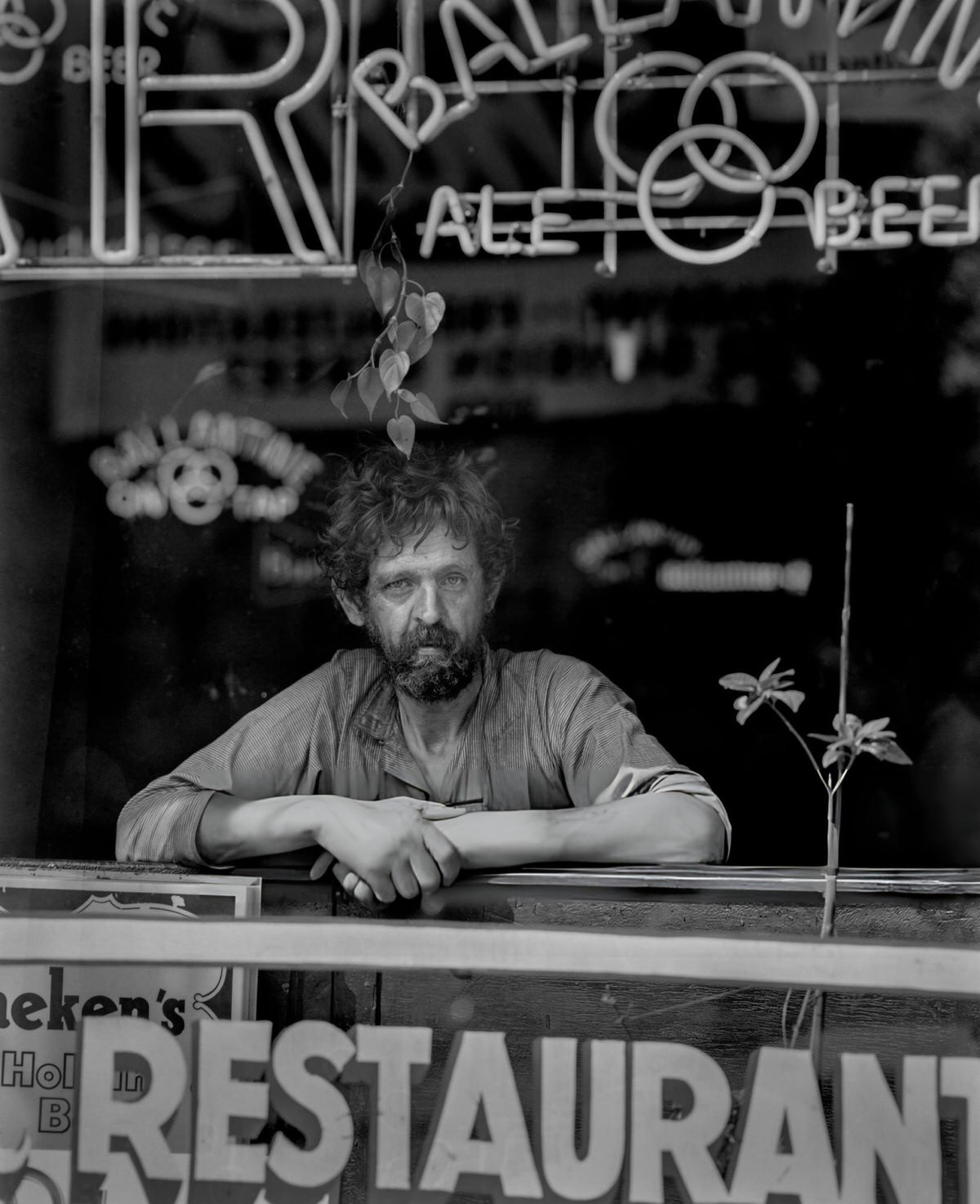 Man Looking Out From The Window Of A Bar In The Bowery, New York, 1964.