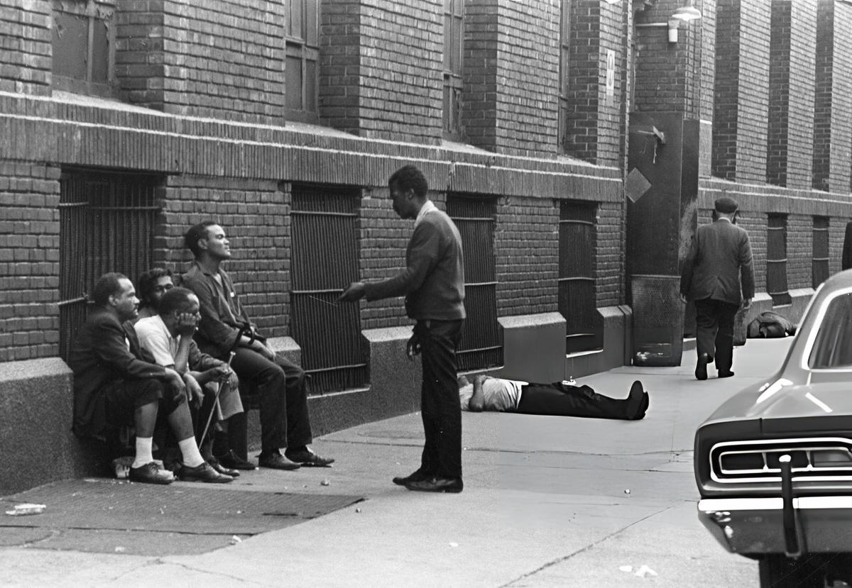 Men Sitting On The Sidewalk Outside The Municipal Lodging House At East 2Nd Street And The Bowery, New York, 1967.