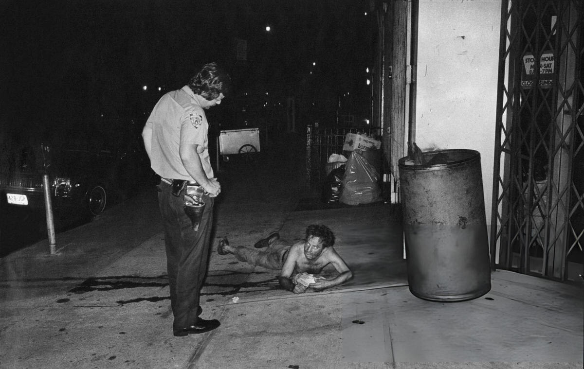 Police Officer Speaking To A Man On The Bowery, New York, 1979.