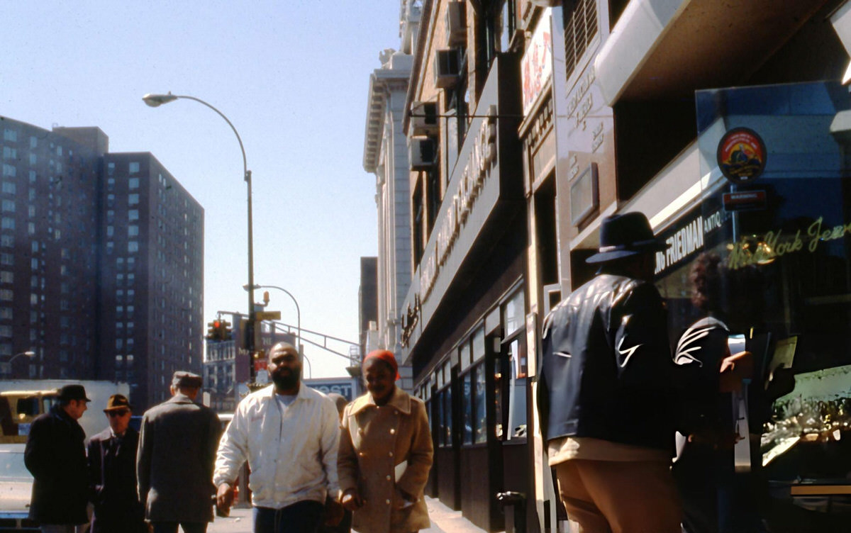 Pedestrians Walking Past The New York Jewelry Exchange At Canal Street And The Bowery, 1979.