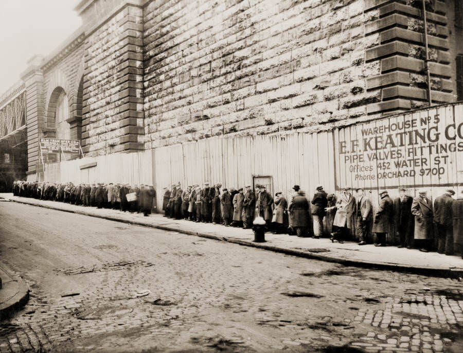 Unemployed Men Wait In A Line For Jobs On Water Street In The Bowery
