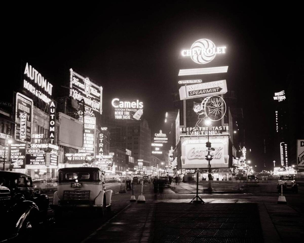 Times Square Looking North From 46Th Street With The Horn And Hardart Automat And Neon Signs, New York, 1936.