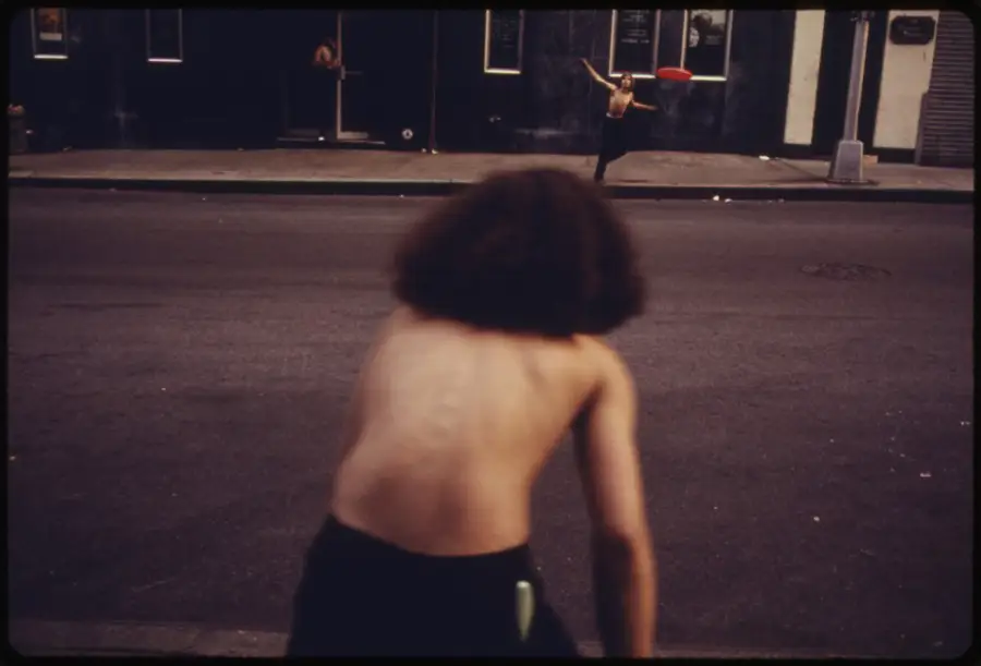 Playing Frisbee In The Street.