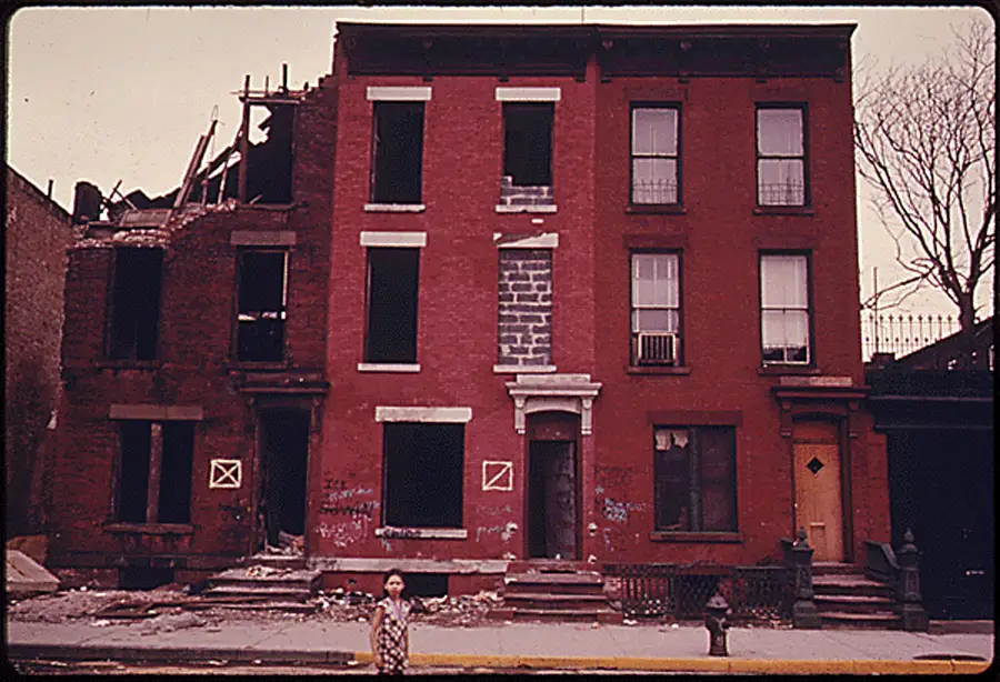 Although Partially Gutted By Fire, One Portion Of This Building Across From Lynch Park, In Brooklyn, Is Still Inhabited.