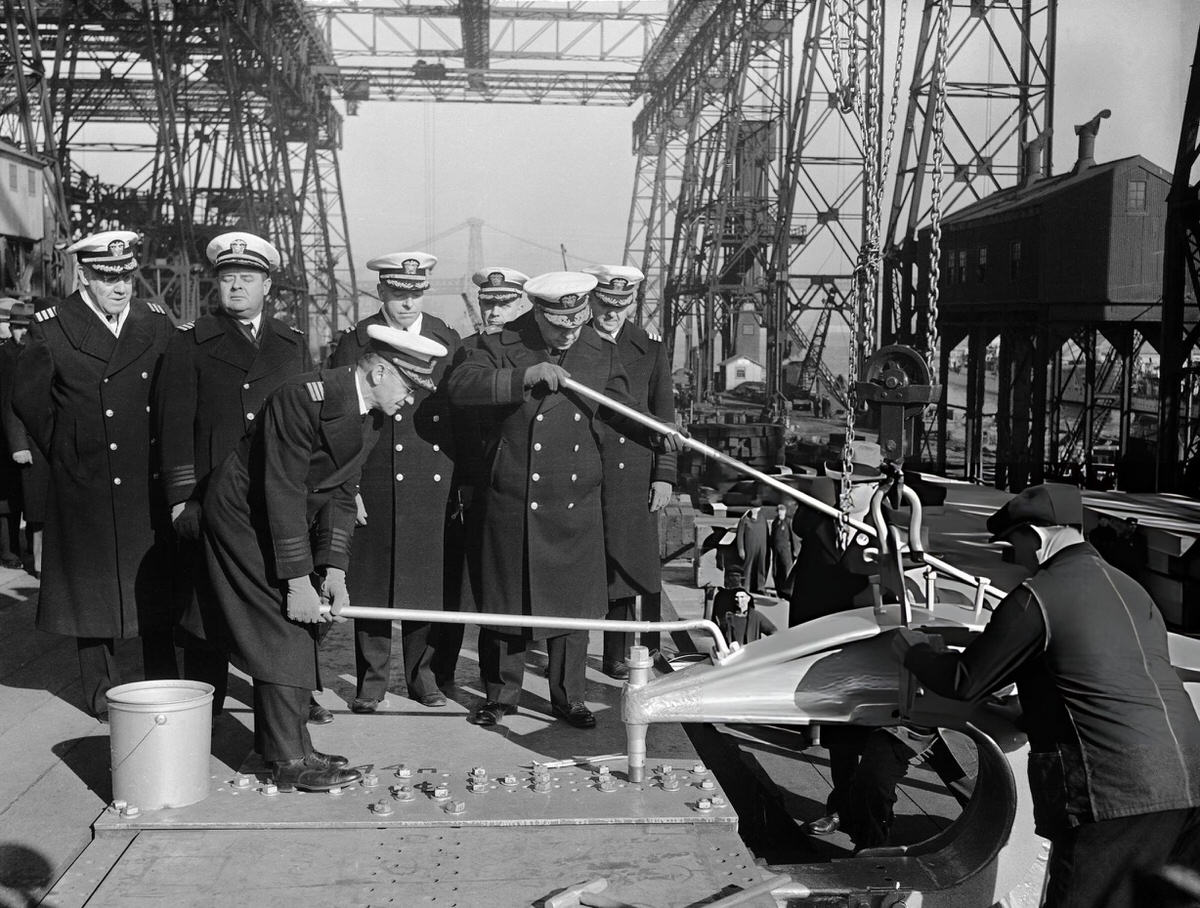 Rear Admiral Clark H. Woodward Driving The First Rivet Into The Keel Of The Battleship Uss Missouri At The Brooklyn Navy Yard, 1941.
