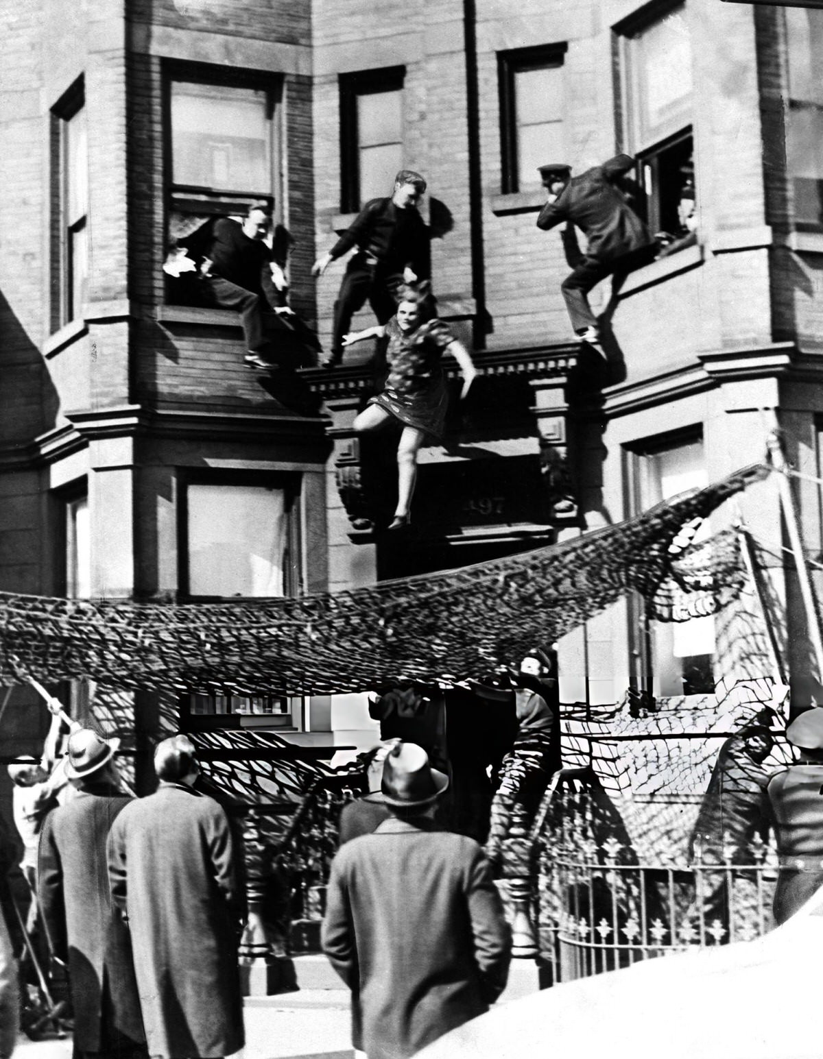 Police Using An Emergency Net To Save Edna Egbert At Her Apartment, Brooklyn, 1942.