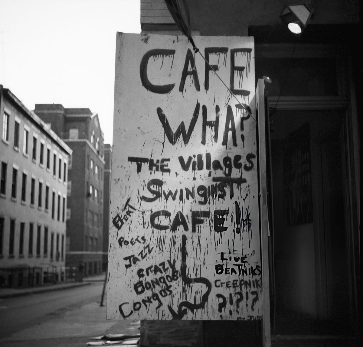 Spray-Painted Sign Outside Cafe Wha? In Greenwich Village Advertising Beat Poets, Jazz, And Live Beatniks, New York.
