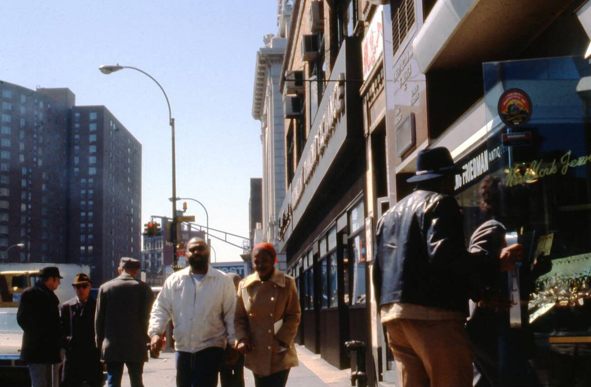 Corner Of Canal Street And The Bowery In Chinatown With Pedestrians Walking Past The New York Jewelry Exchange, 1979.