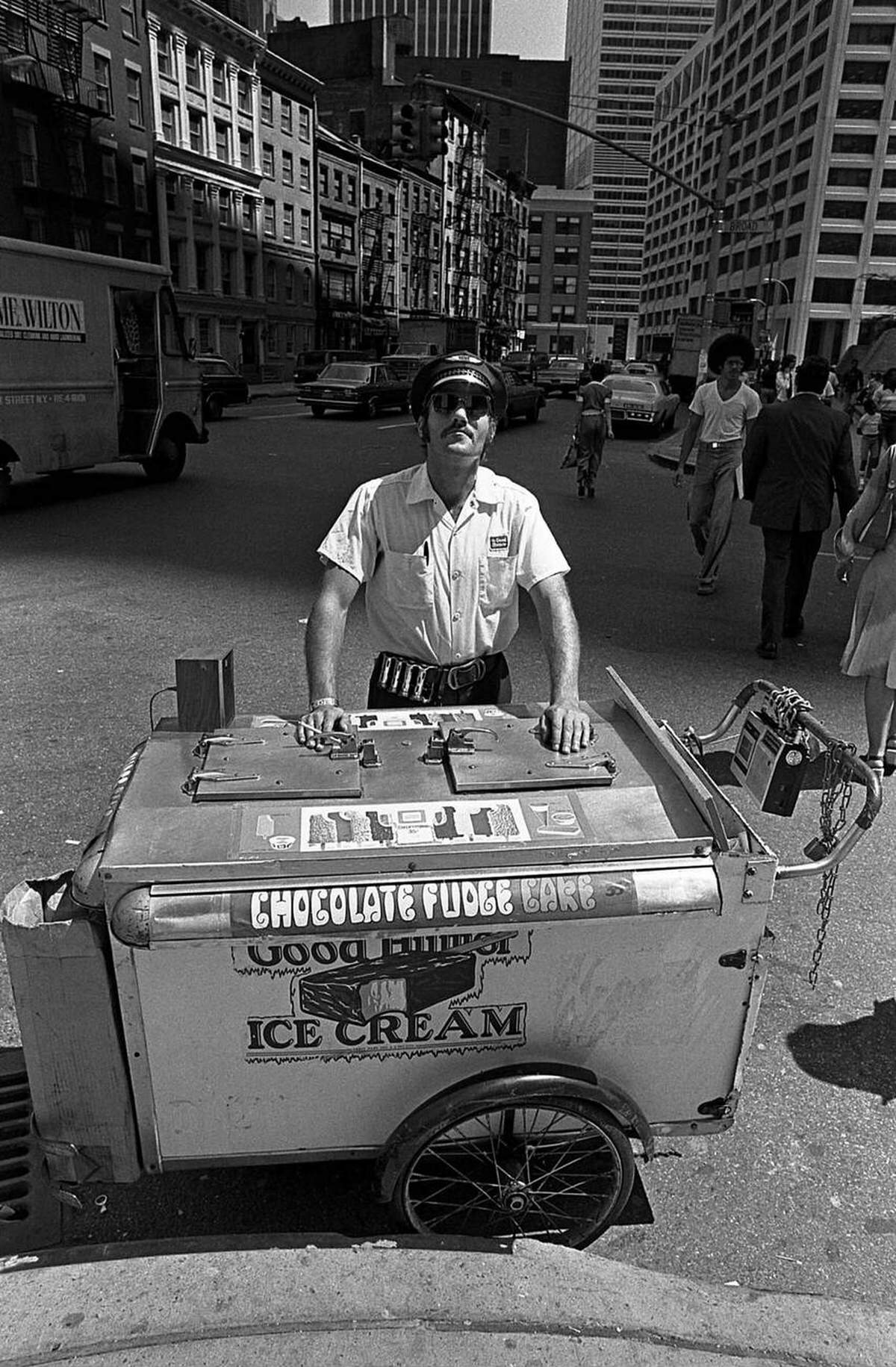 Ice Cream Vendor At The Corner Of Broad And Water Streets, Lower Manhattan, 1975.