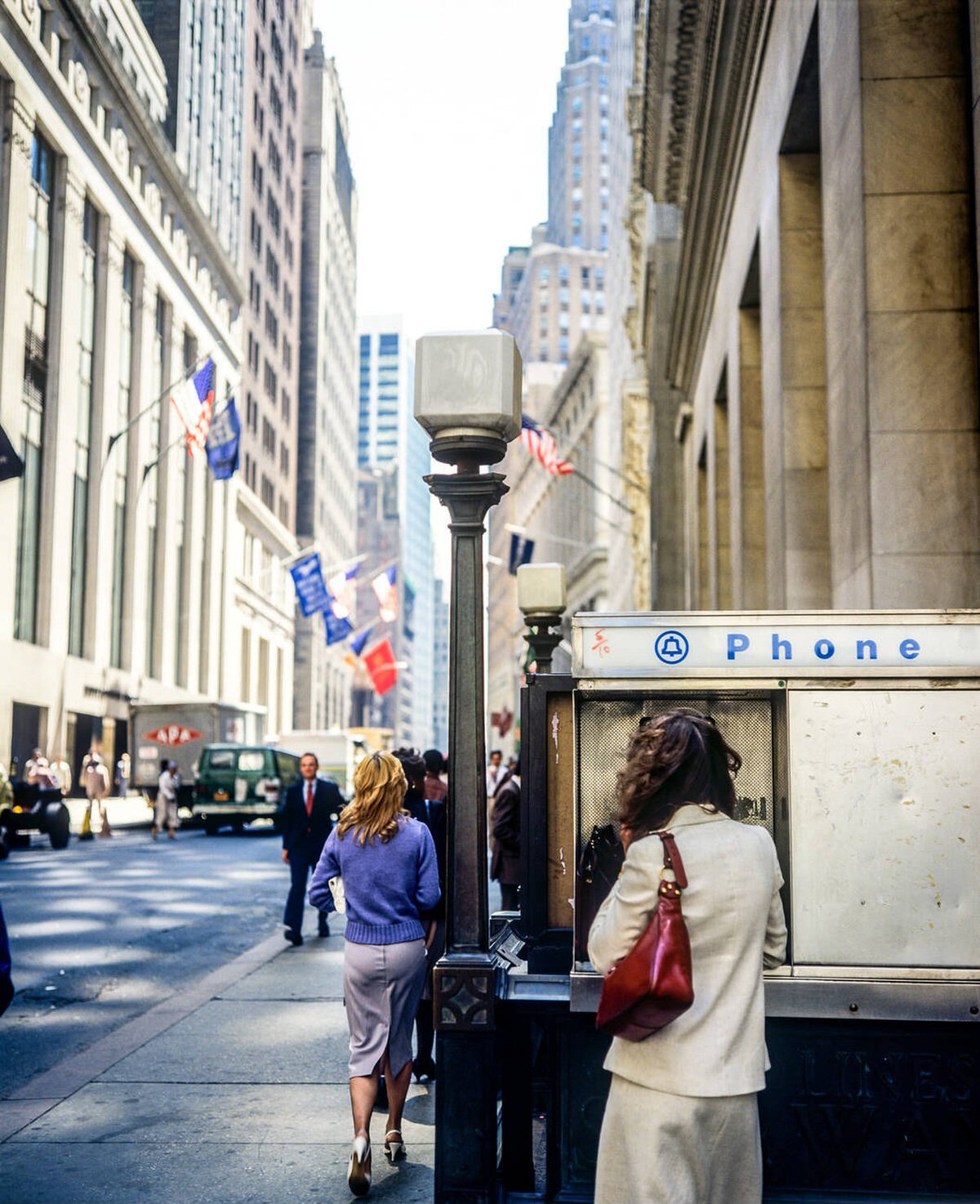 Woman Using A Public Pay Phone Booth On Wall Street, 1982.