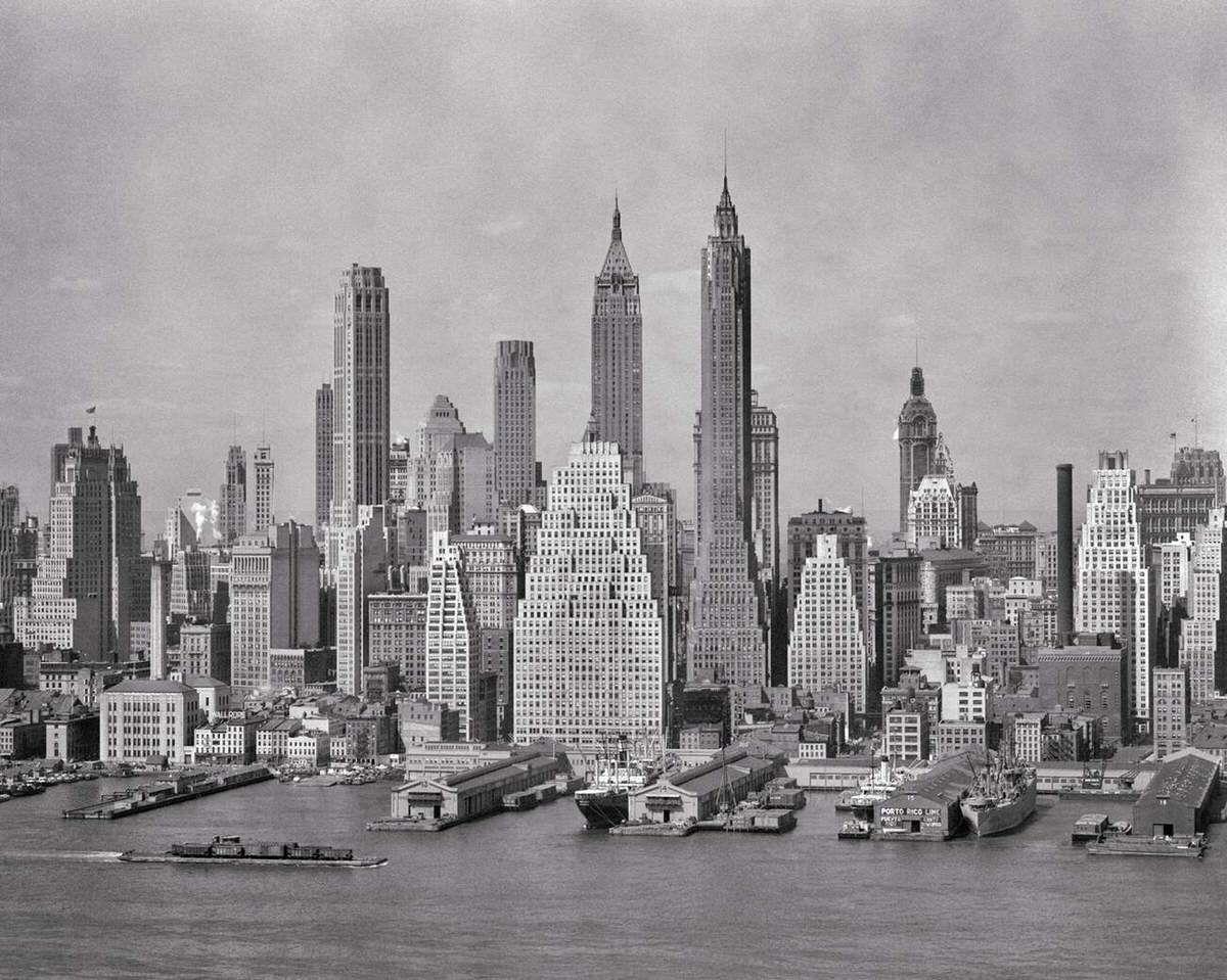 Skyline Of The Financial District Featuring The Woolworth Building, Irving Trust, And 40 Wall Street From Brooklyn, 1948.