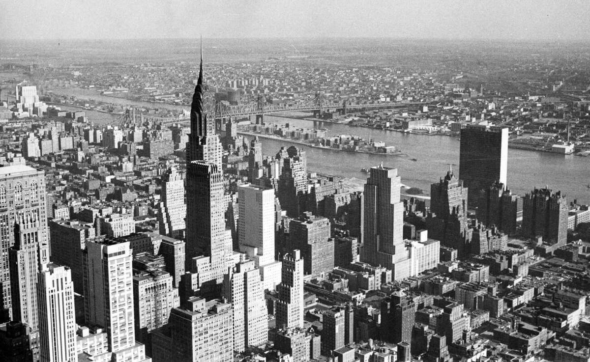 Aerial View Of Manhattan And Queens Featuring The Chrysler Building, United Nations, And Queensboro Bridge, 1950S.