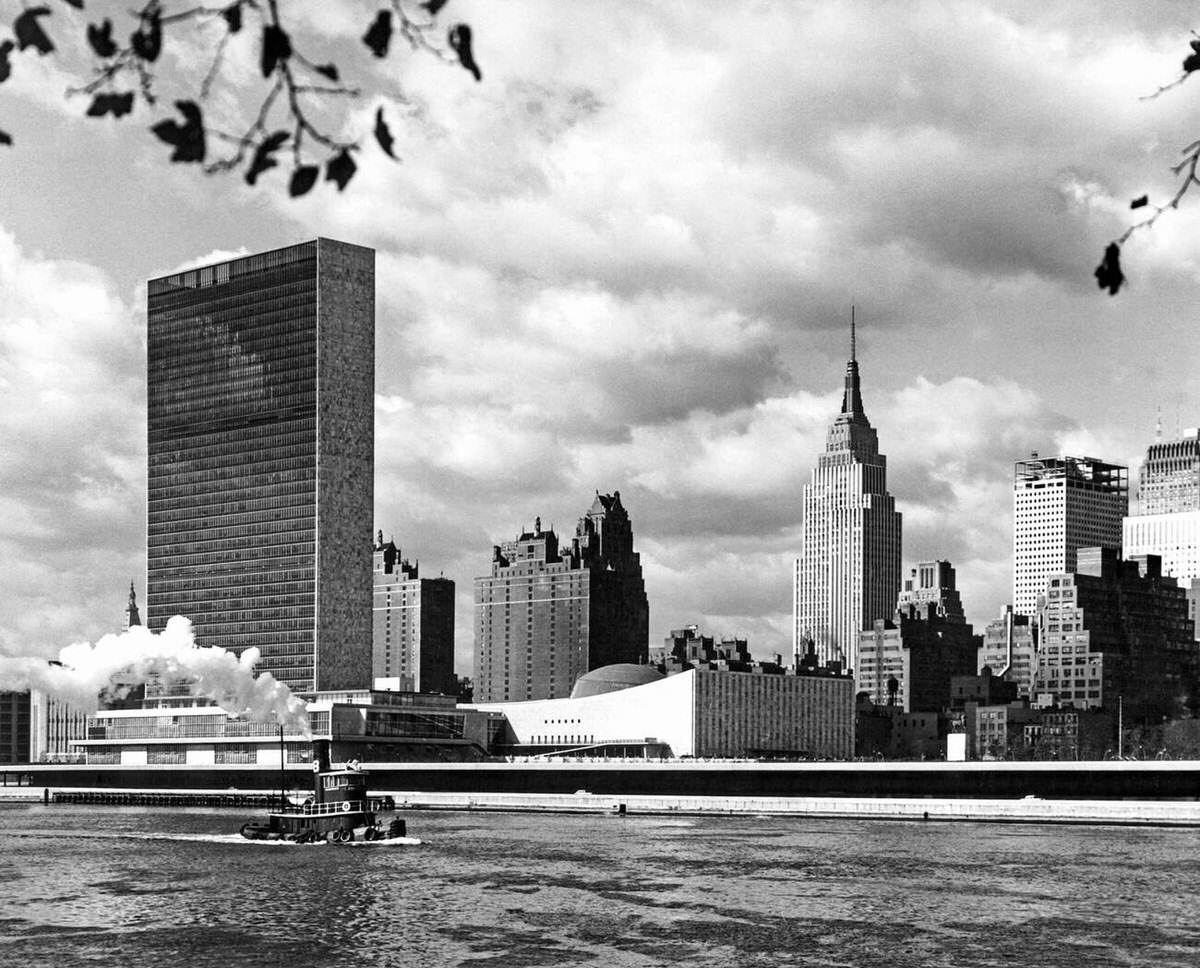 United Nations Buildings On The East River With The Empire State Building In The Background, 1955.