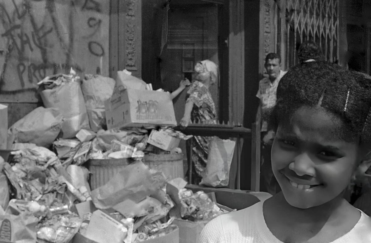 Young Girl Posing Beside A Pile Of Garbage During The Young Lords Party'S Garbage Offensive In El Barrio, East Harlem, 1969.