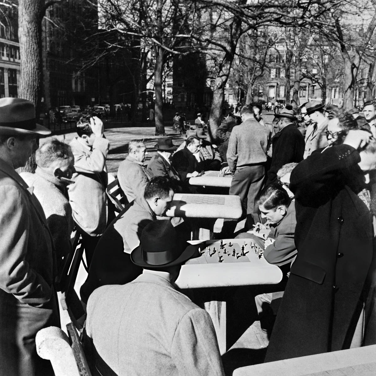 Men Playing Chess On Stone Tables In A Greenwich Village Park, 1960S.