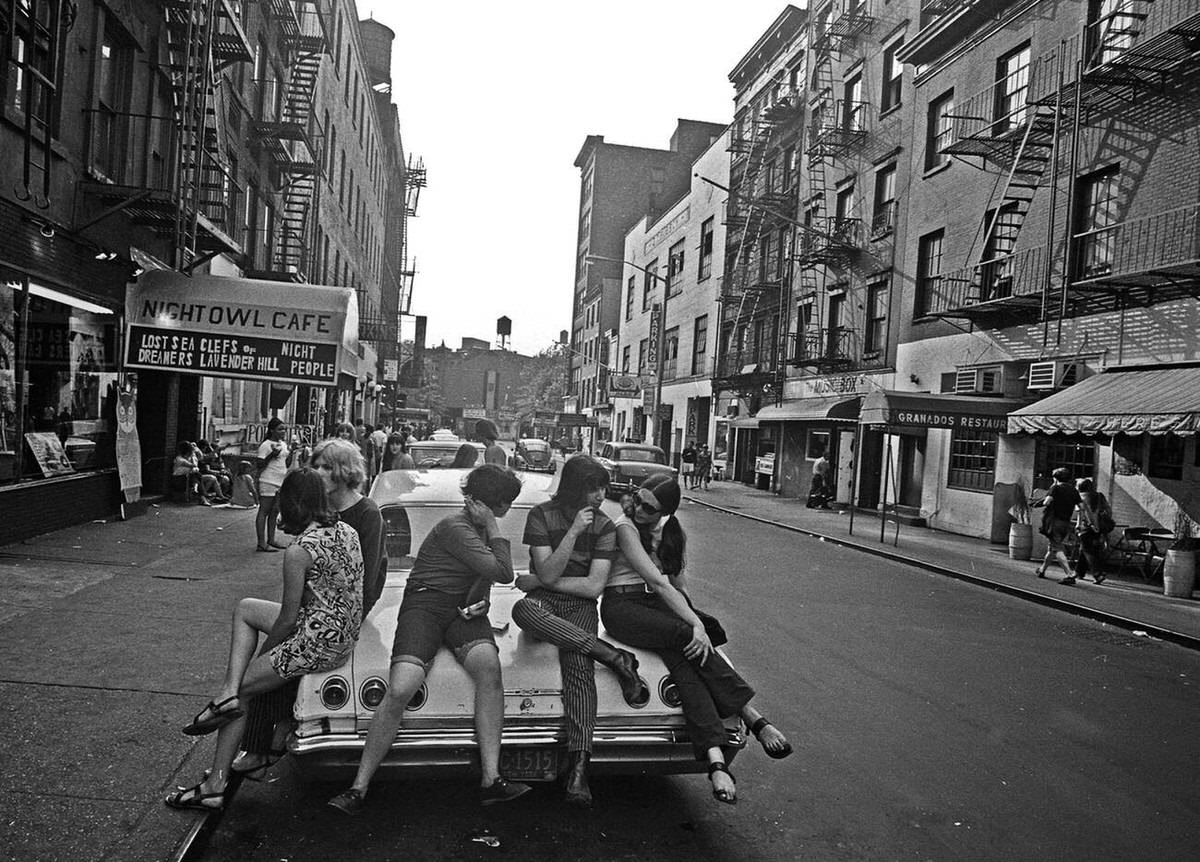 Teenagers Sitting On A Car Hood In Front Of A Greenwich Village Cafe, 1967.