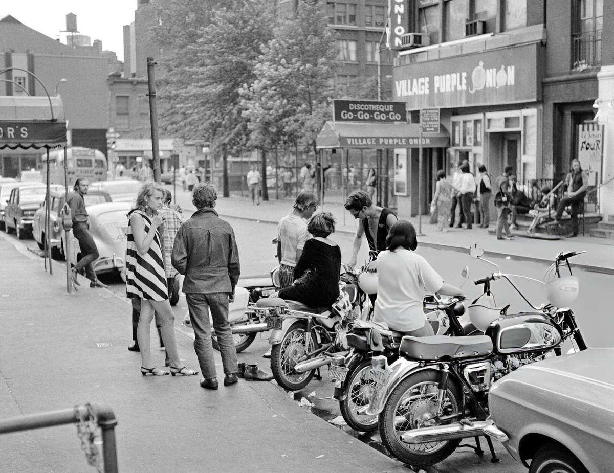 Young Adults With Motorcycles Across From The Purple Onion Go-Go Bar, Greenwich Village, 1960S.