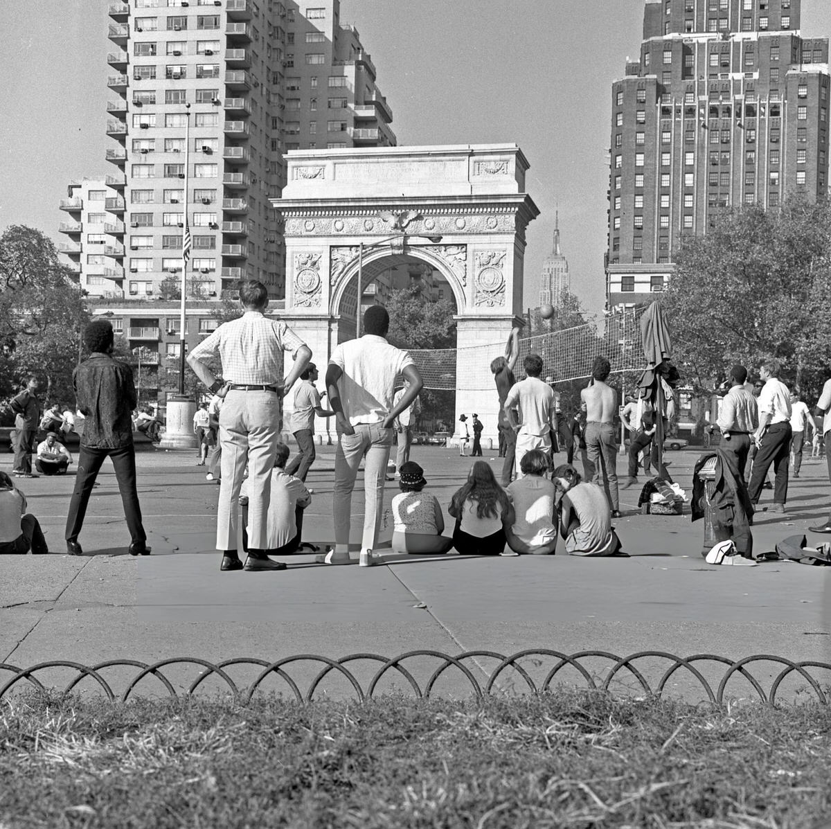 Spectators Watching A Volleyball Game In Washington Square Park, 1968.
