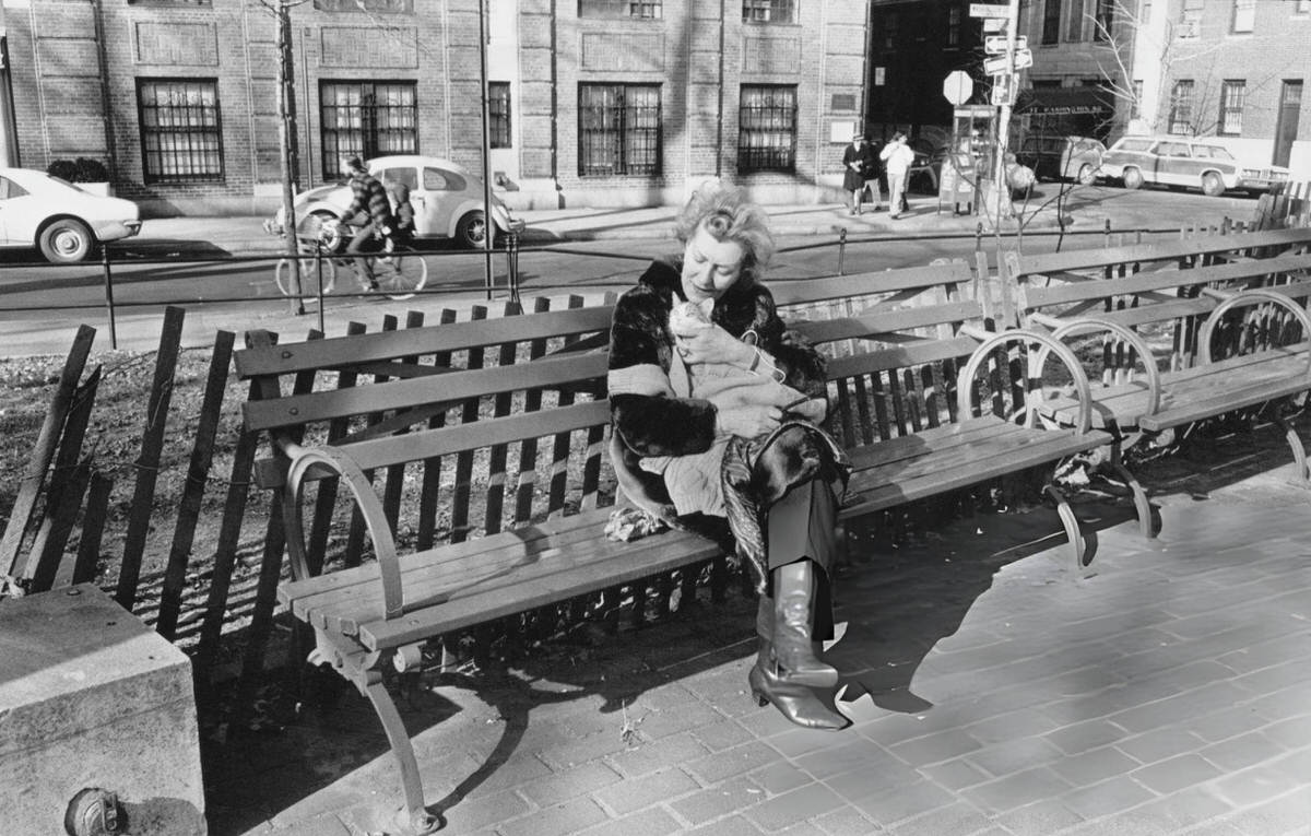 Woman With A Pet Cat In Washington Square Park, 1975.