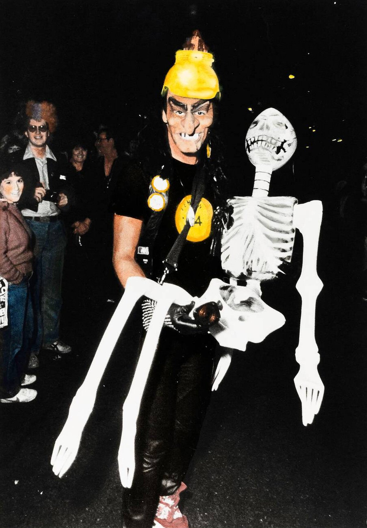 Man With A Skeleton At The Village Halloween Parade, New York, 1983.