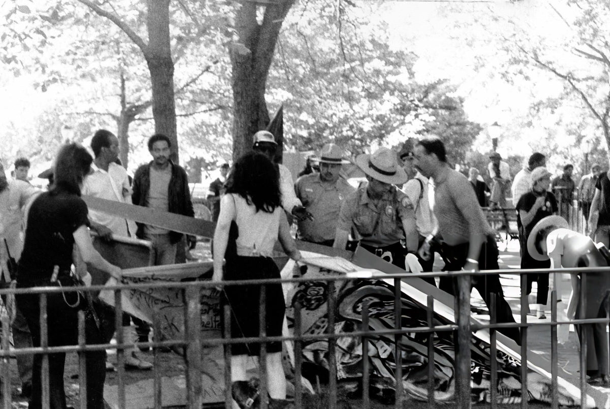 Park Rangers Removing A Wooden Shelter From Tompkins Square Park, 1989.