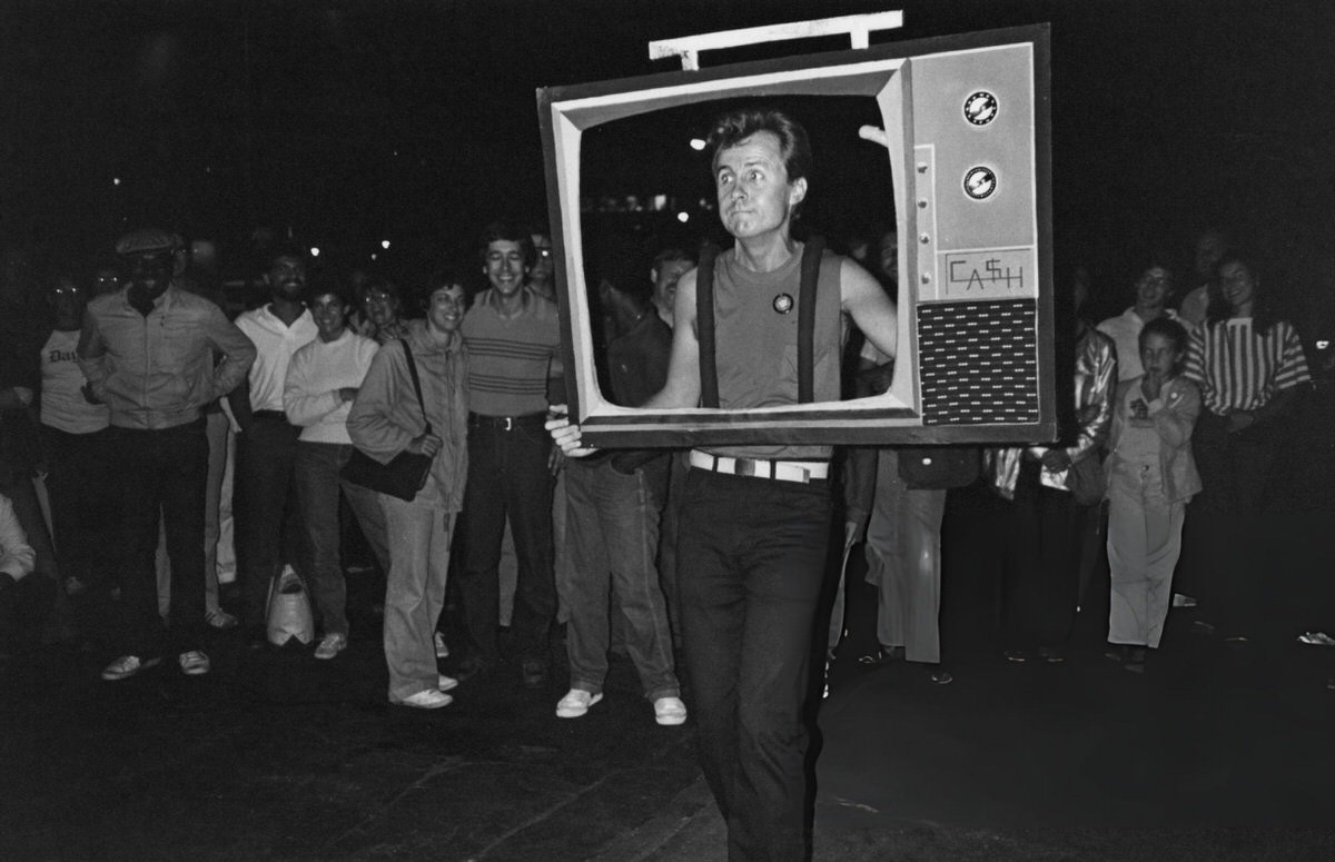Man With A Television Set Cutout At The Village Halloween Parade, 1981.