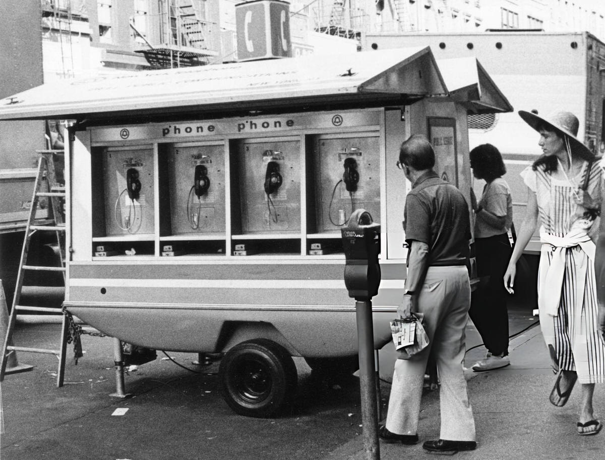 People Using Mobile Public Telephones In Greenwich Village, 1985.