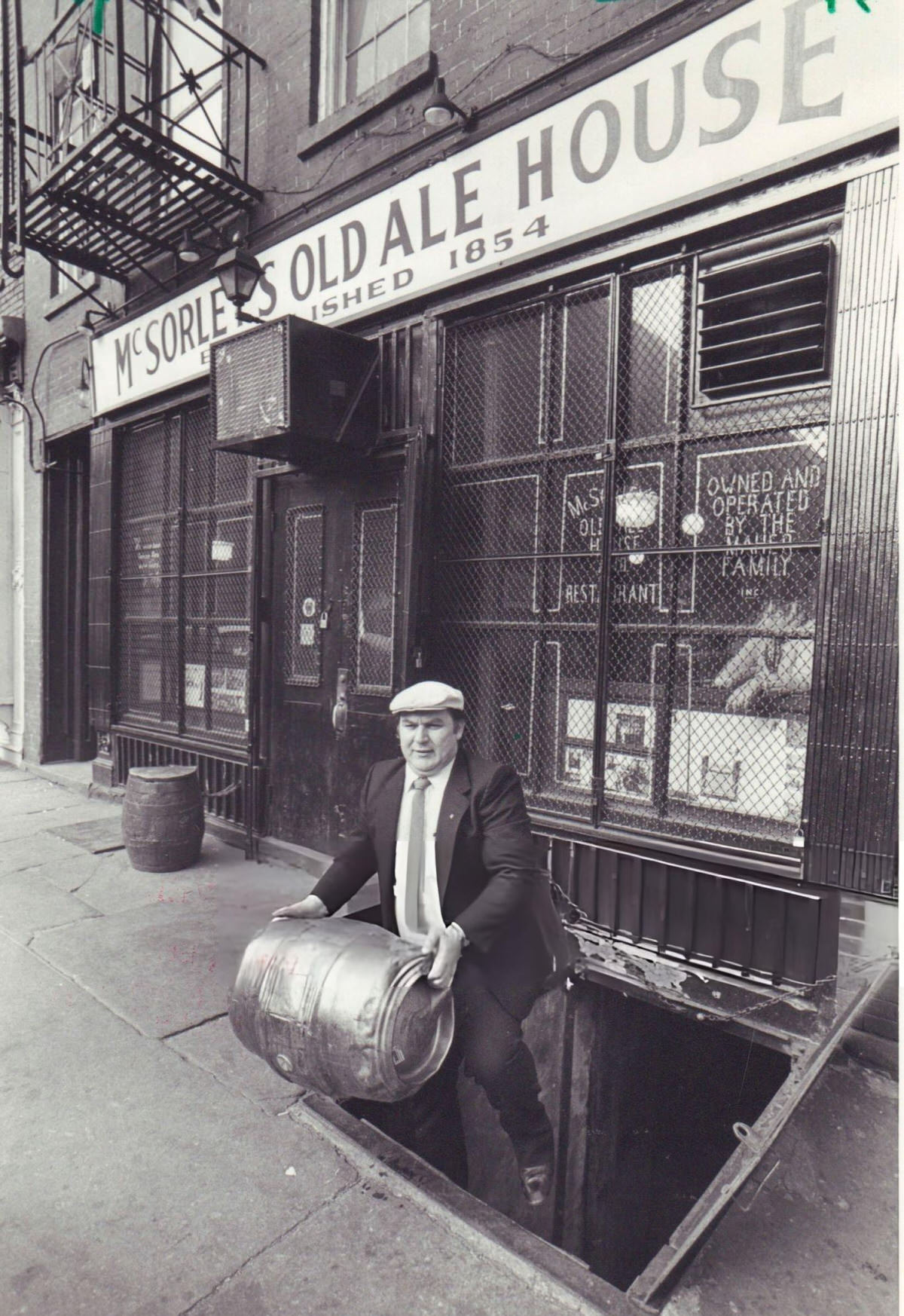 Matty Maher Moving A Keg Outside Mcsorley'S Old Ale House, Manhattan, 1985.