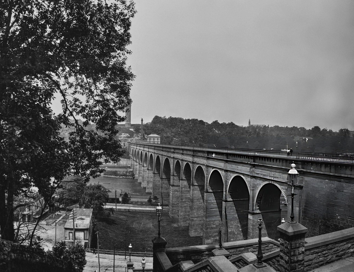 High Bridge Spanning The Harlem River With The Highbridge Water Tower In The Distance, 1920.