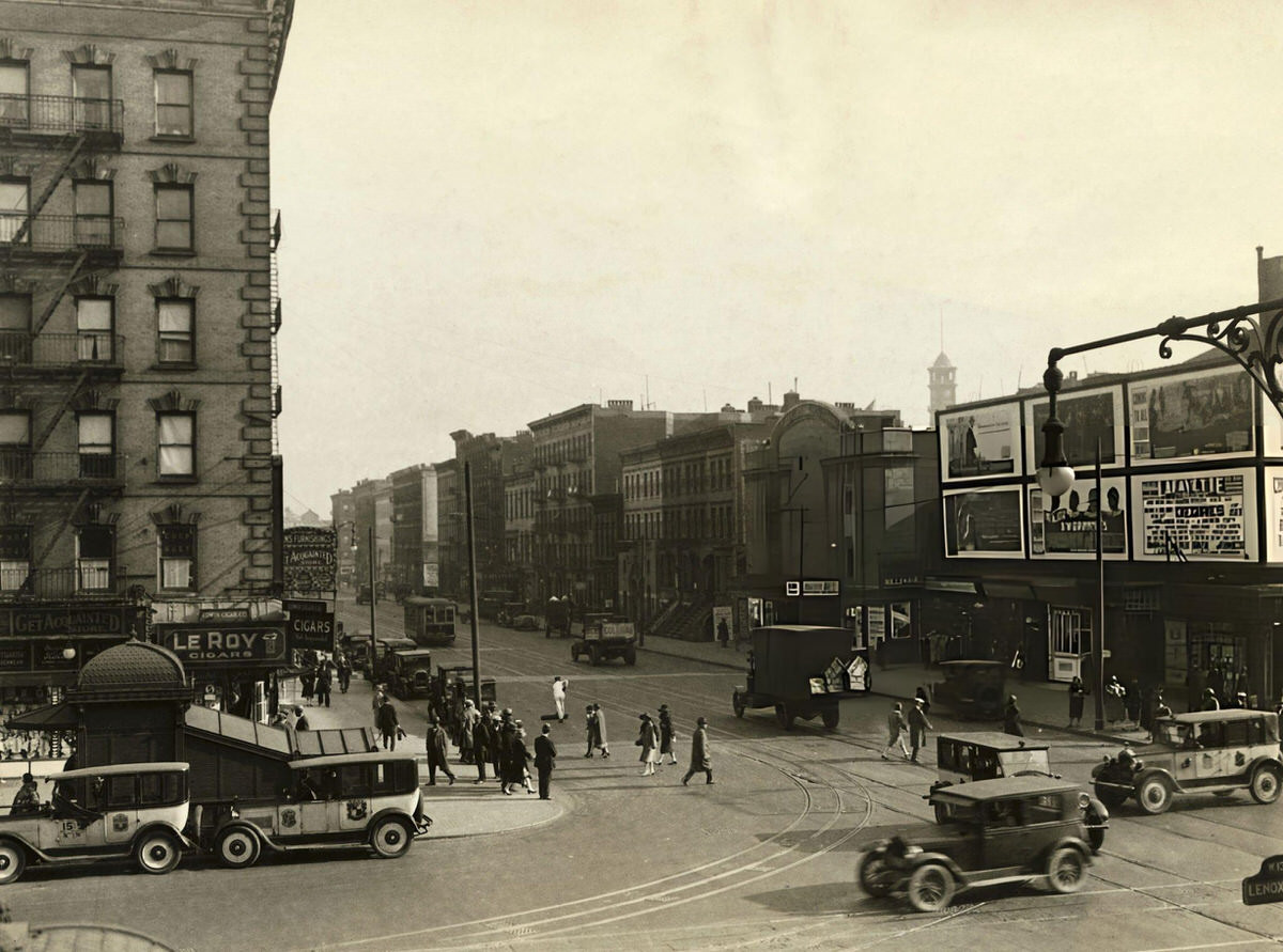 High Angle View Of Lenox Avenue Showing Trolley Tracks And Traffic, Harlem, 1927.