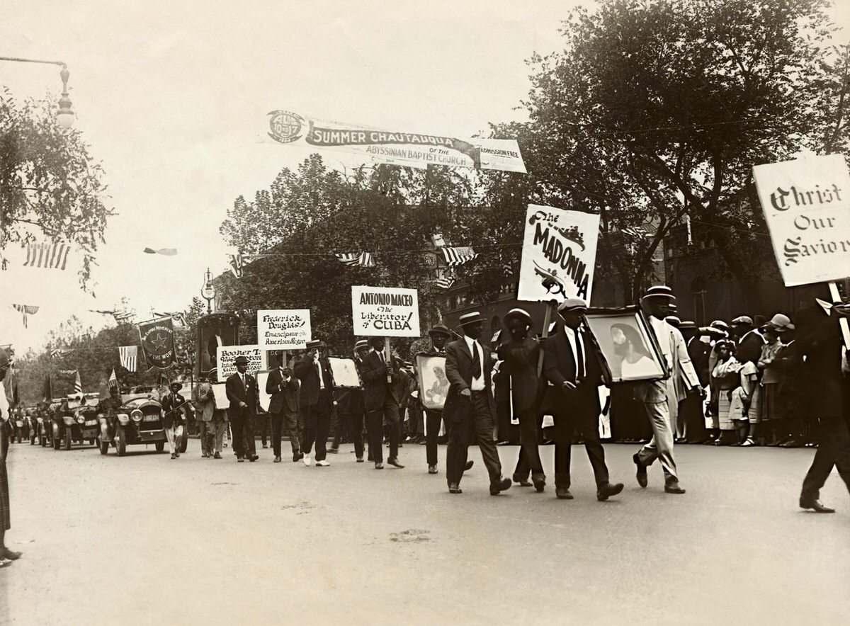 Marchers In A Parade For The Provisional Republic Of Africa Carrying A Painting Of The Ethiopian Christ, Harlem, 1920.