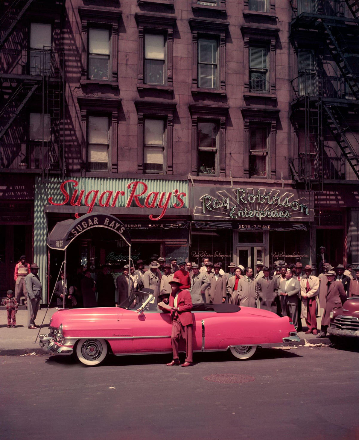 Sugar Ray Robinson With His 1950 Cadillac In Front Of His Businesses At 124Th Street And 7Th Avenue, Harlem, 1950.