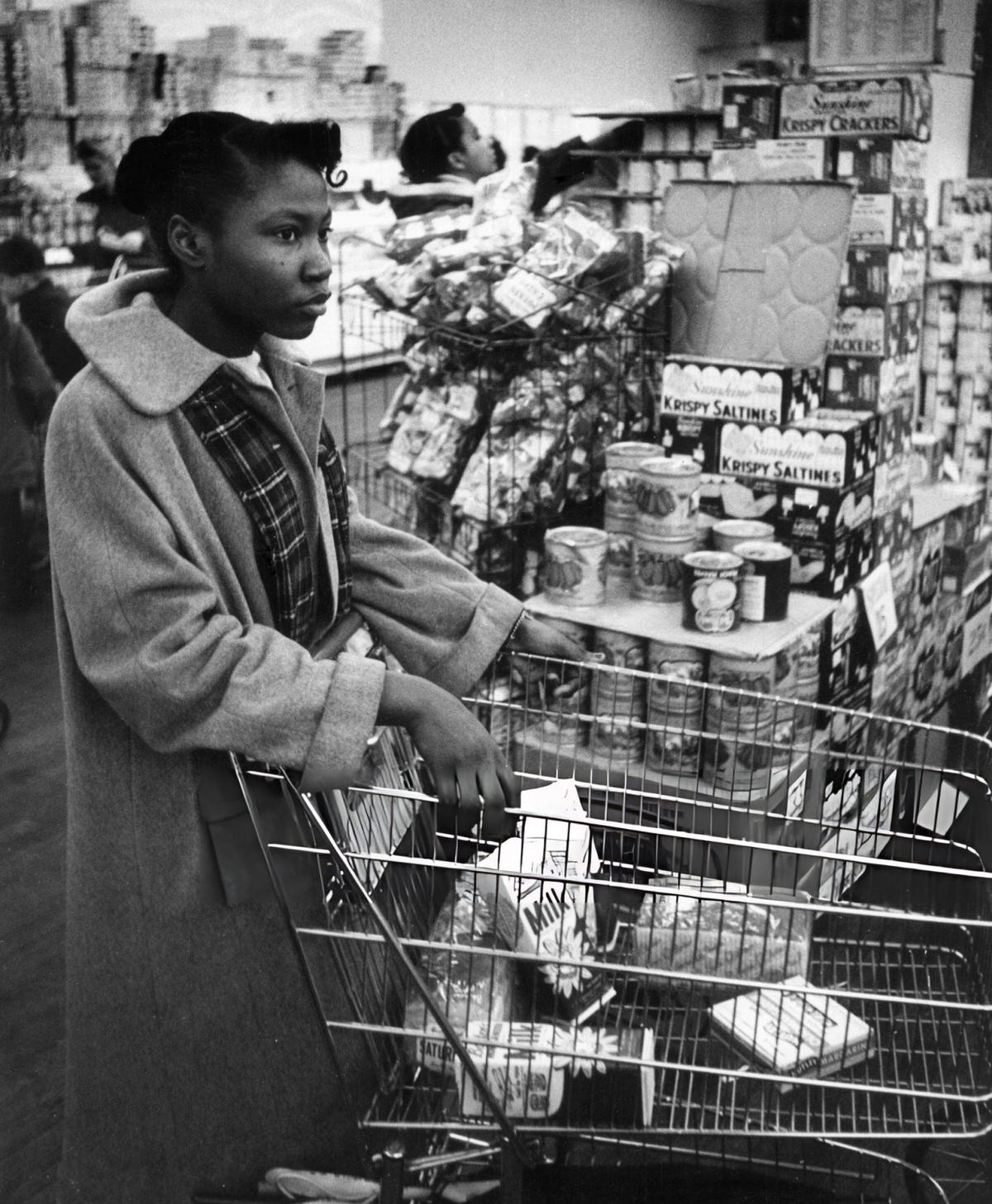 Girl Pushing A Shopping Trolley In A Harlem Supermarket, 1956.