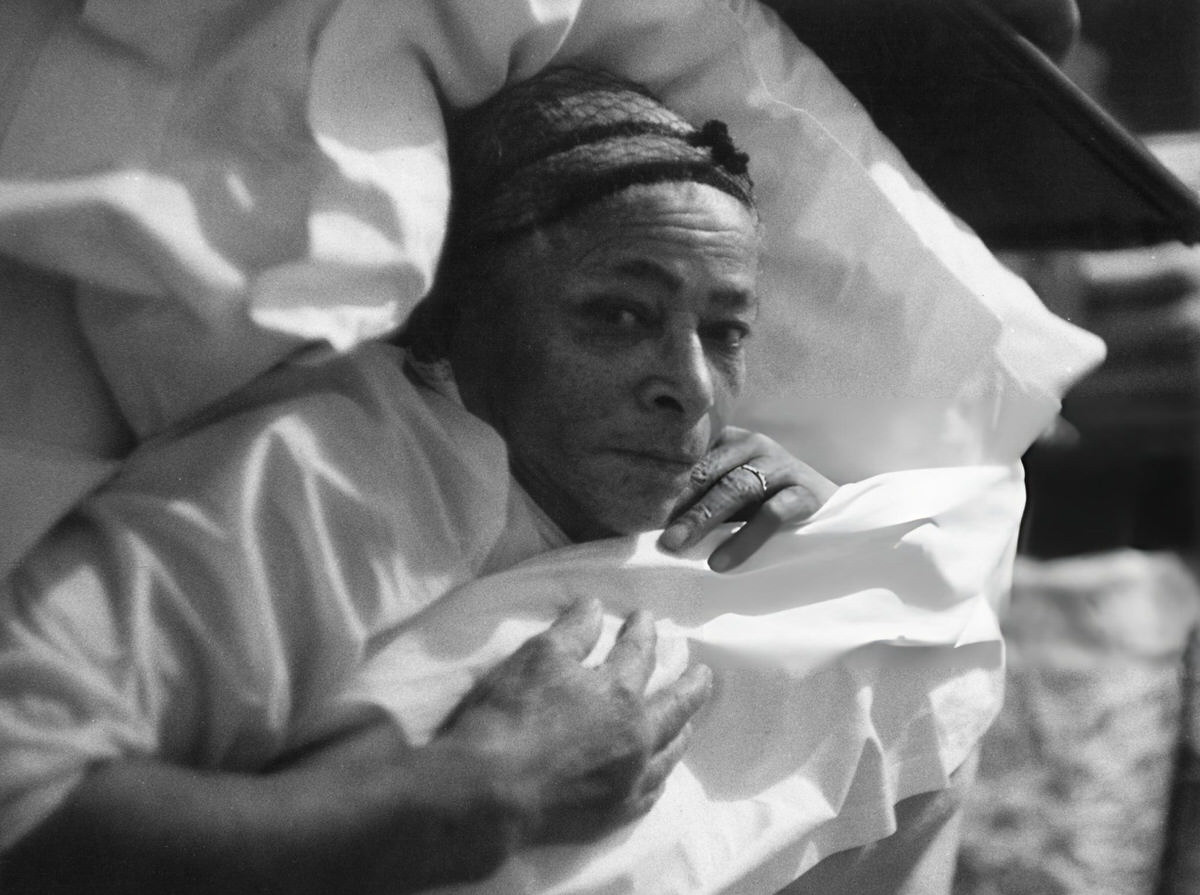 Elderly Woman In Bed In A Harlem House, 1956.