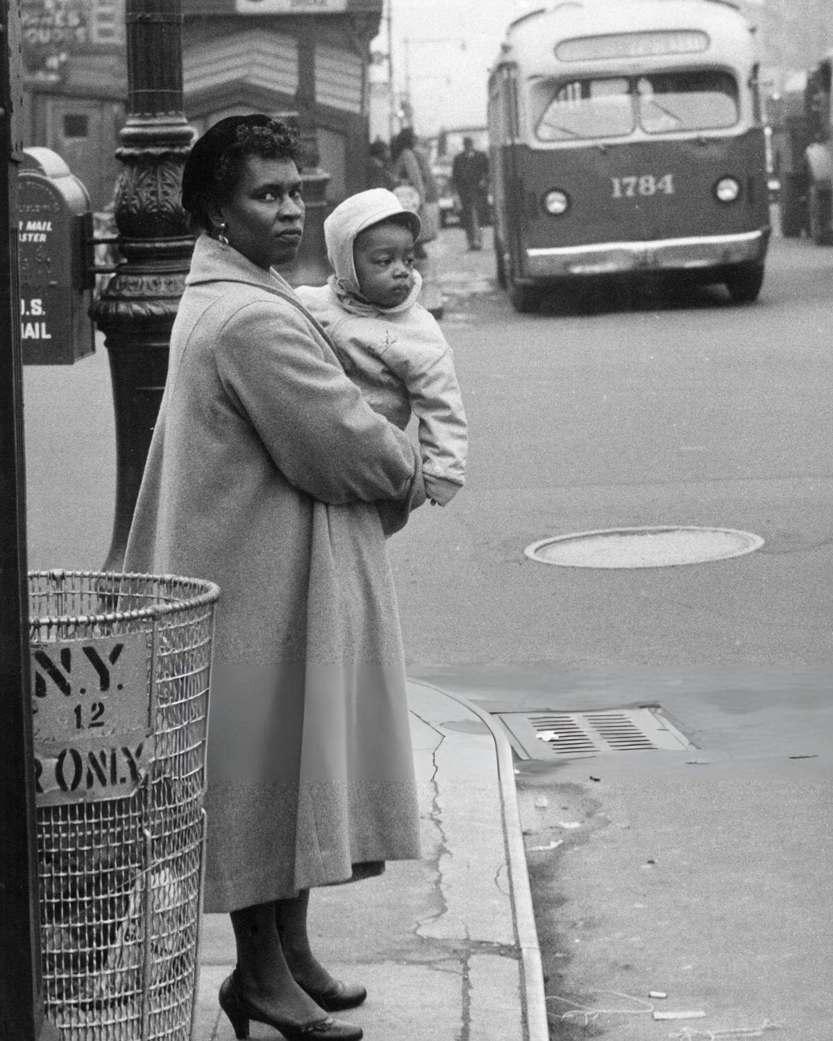 Woman Holding A Child On A Harlem Roadside, 1956.