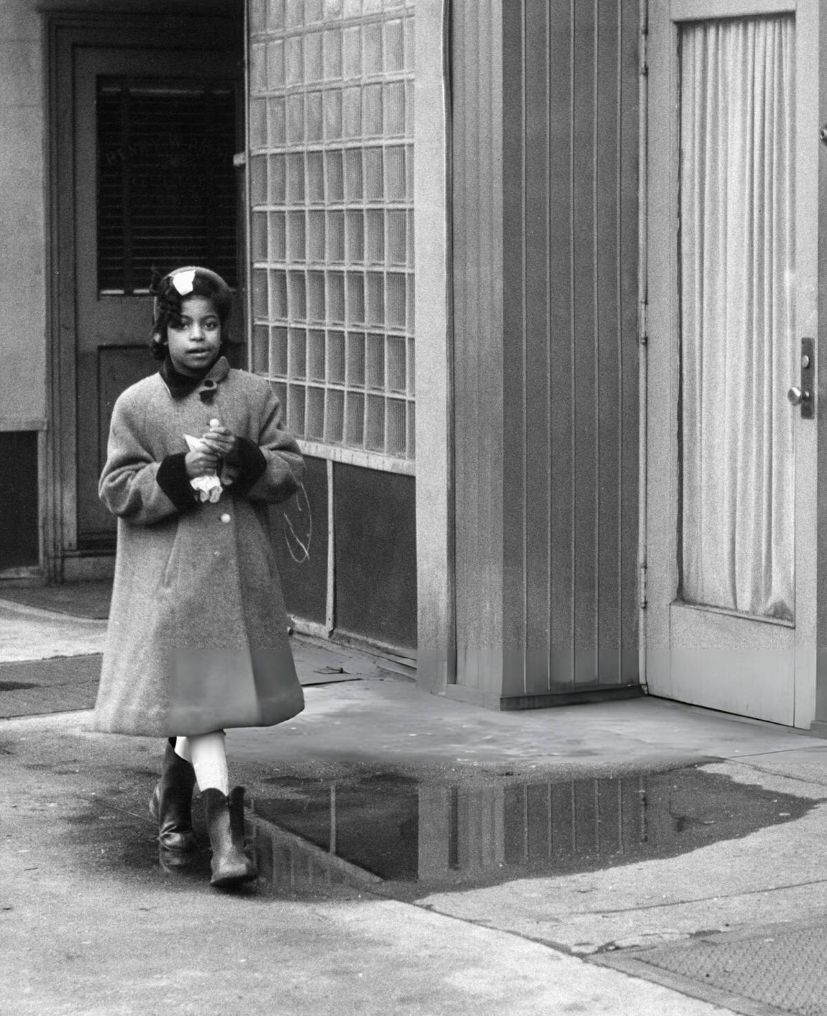 Girl Walking On A Harlem Sidewalk, 1956.