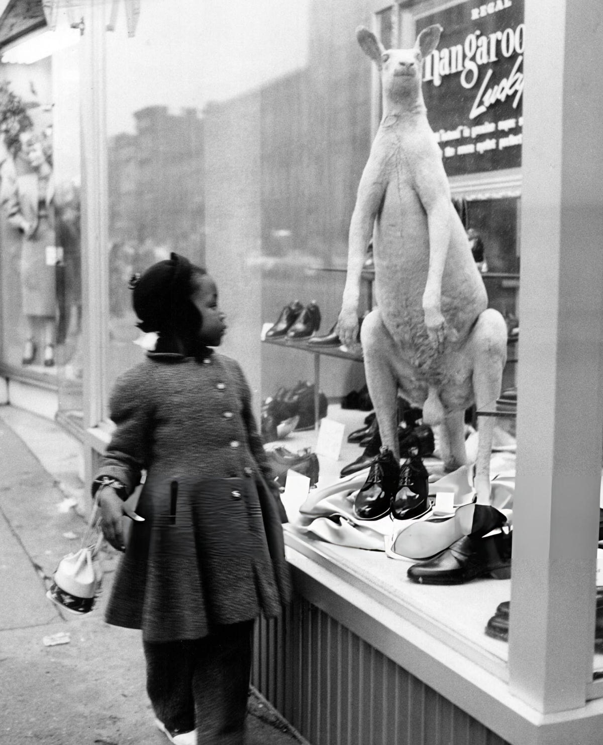Child Looking In The Window Of A Shoe Shop, Harlem, 1956.