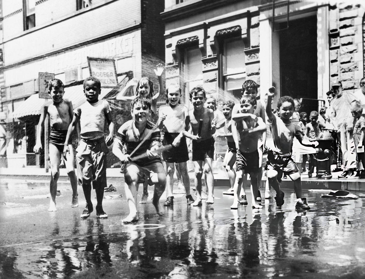 Children Playing In Water From A Fire Hydrant, Harlem, 1950S.