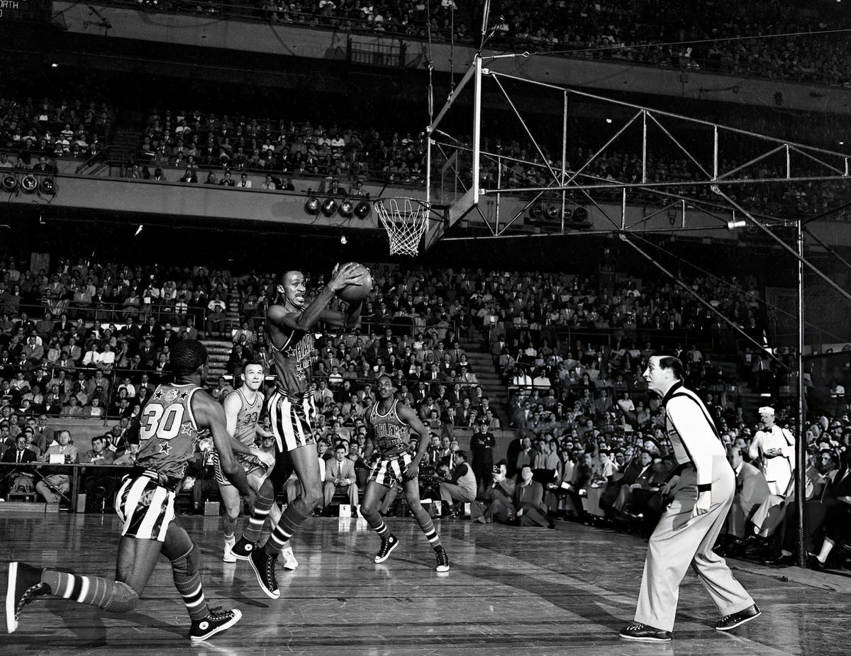 Marques Haynes Of The Harlem Globetrotters During A Game Against The College All-Stars, 1953.